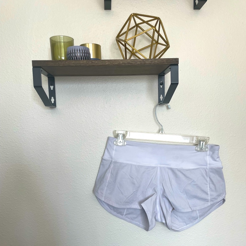White lululemon running shorts size 4